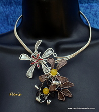 Floris - torque necklace with a floral theme in hand woven flowers by Caprilicious Jewellery