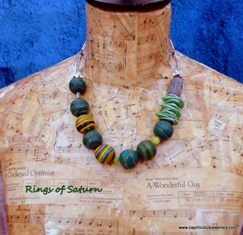 Polymer clay bead necklace - Rings of Saturn by Caprilicious Jewellery