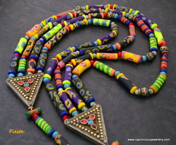 Fiesta - a polymer clay bead multistrand necklace with tribal connectors by Caprilicious Jewellery