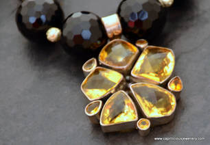 Onyx and topaz, silver necklace by Caprilicious Jewellery