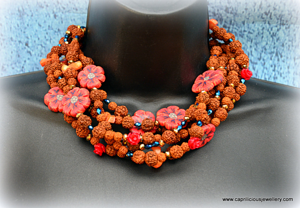 One of a kind rudraksh and polymer clay flower necklace by Caprilicious Jewellery