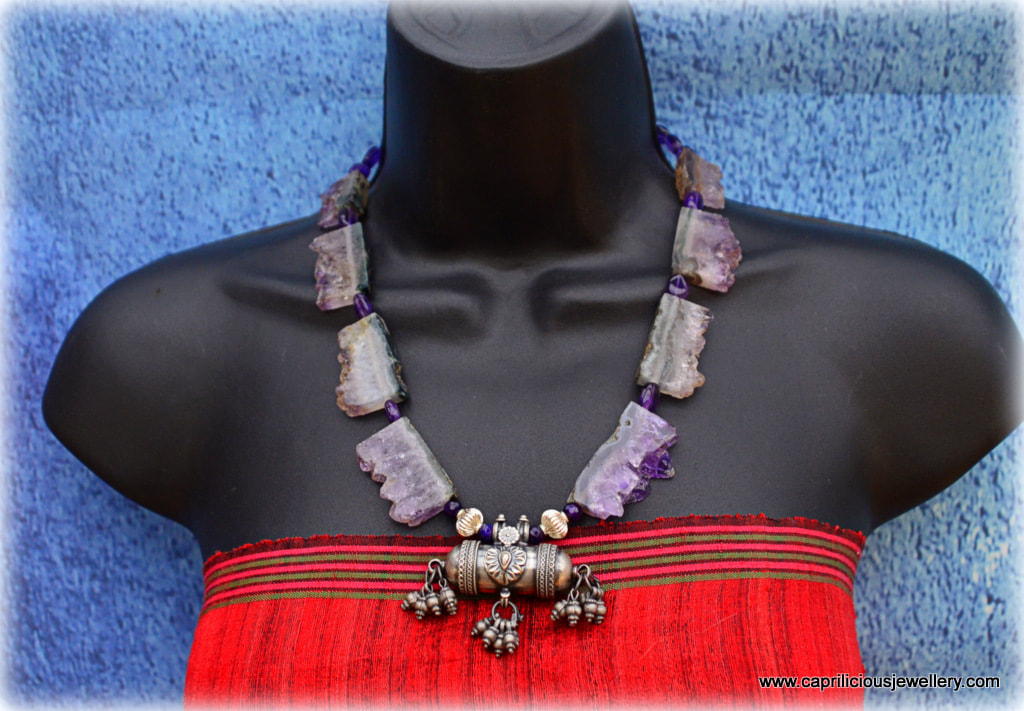 Amethyst geode bead and sterling silver amulet in a statement necklace by Caprilicious Jewellery