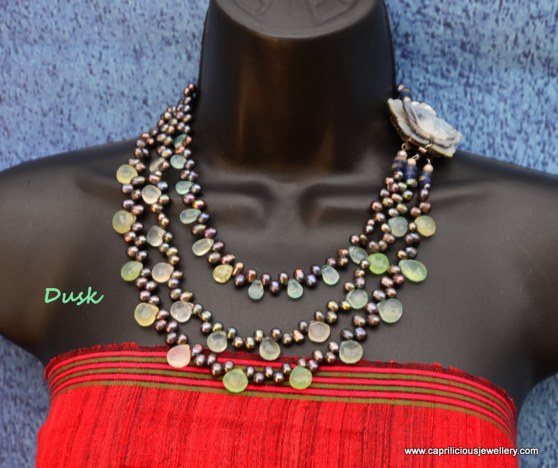 Dusk - three strands of peacock pearls, prehnite teardrop beads, carved shell clasp by Caprilicious Jewellery