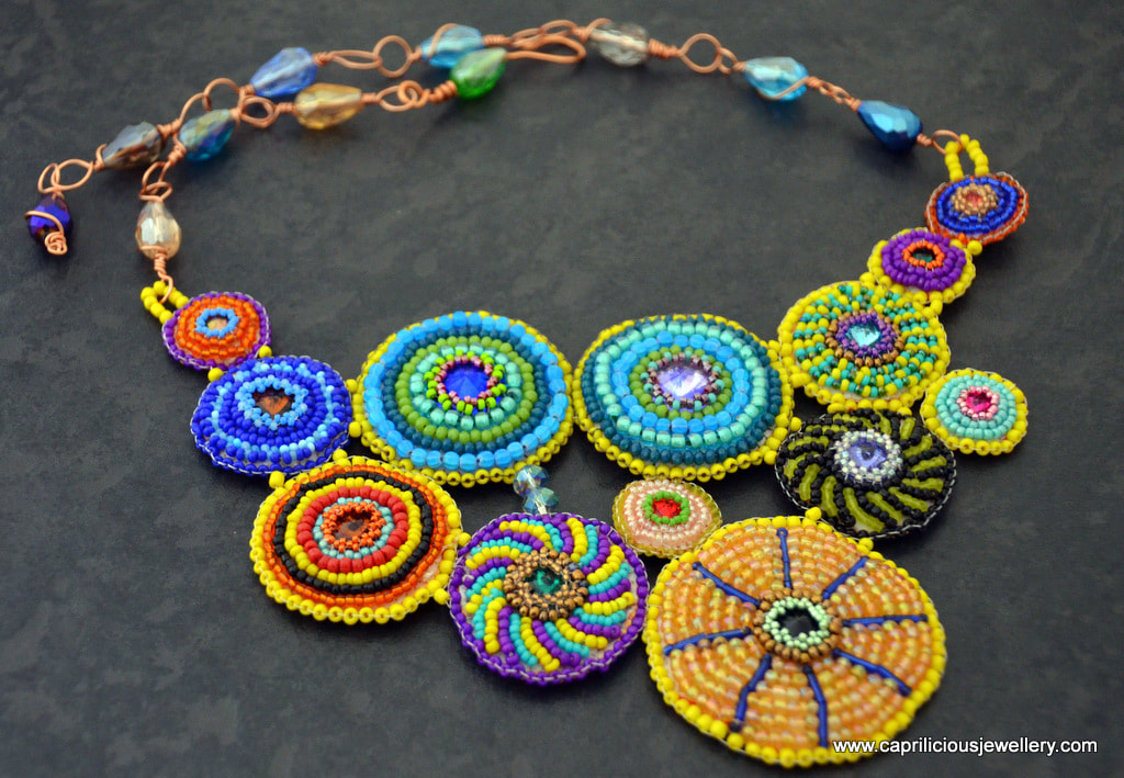 Arriba - a patchwork circle beaded multicolour necklace by Caprilicious Jewellery.
