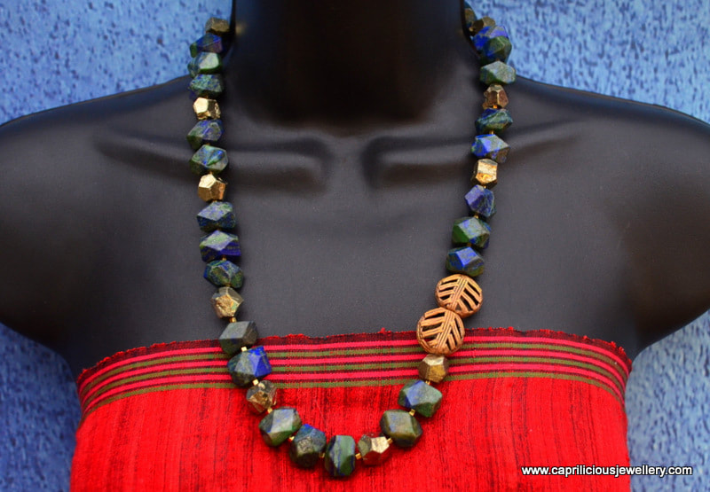 Poppy - bronze clay flower, dyed blue jade necklace, Kenyan lost wax cast beads, handmade wire clasp by Caprilicious Jewellery