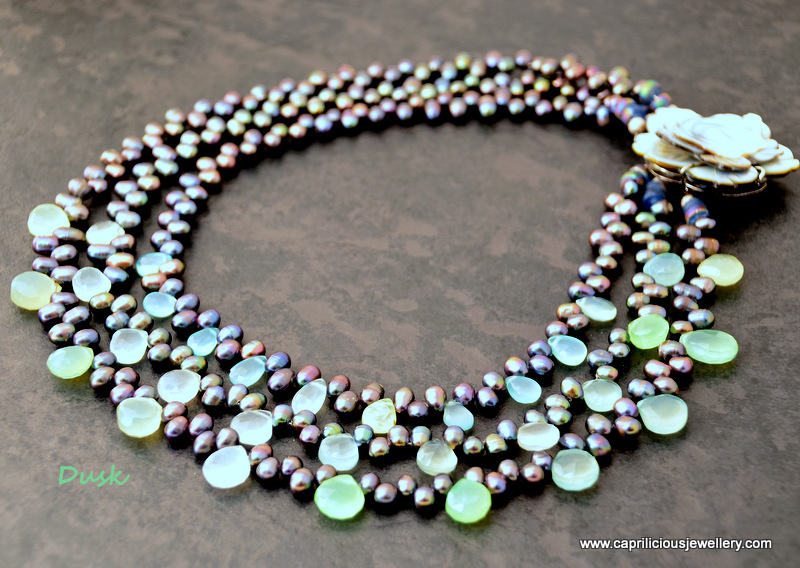Dusk - three strands of peacock pearls, prehnite teardrop beads, carved shell clasp by Caprilicious Jewellery
