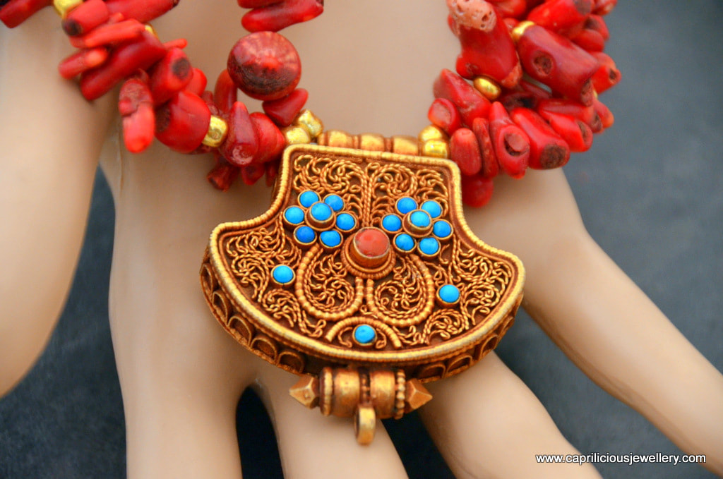 Kalachakra Ghau box with a coral and howlite necklace by Caprilicious Jewellery