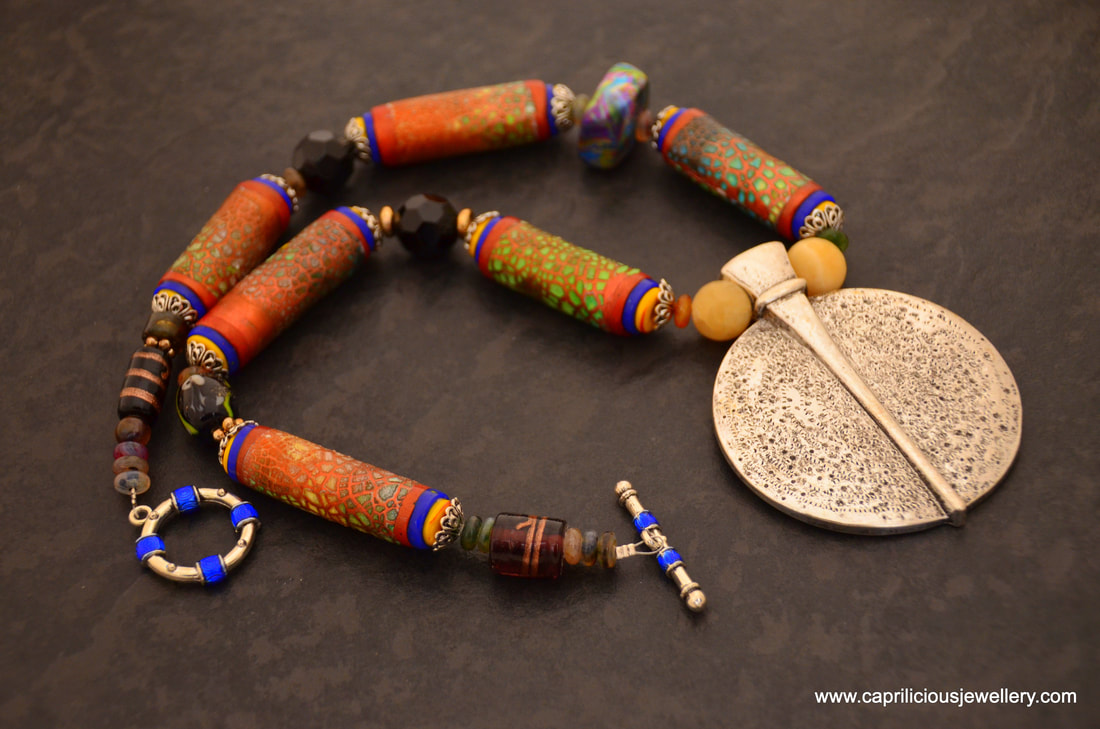 Octarine - a tribal necklace with polymer clay and Kroma Krackle  beads by Caprilicious Jewellery