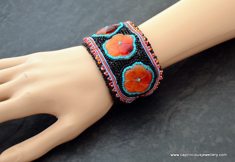 Carnelian flower and soutache/ beadwork cuff bracelet by Caprilicious Jewellery