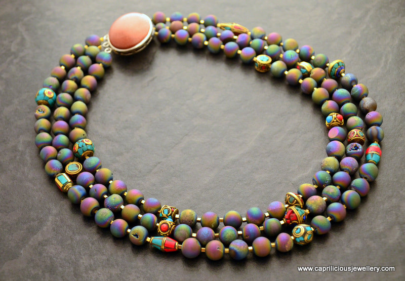 The oil slick necklace, titanium coated druzy and Tibetan beads by Caprilicious Jewellery
