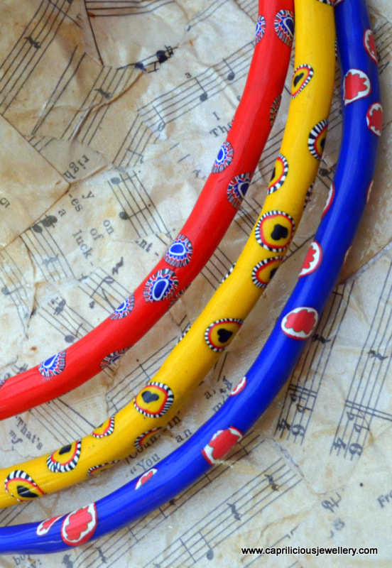 Tribal colourful polymer clay tube necklace inspired by Maasai wedding necklaces by Caprilicious Jewellery