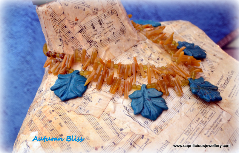 Blue agate leaves, hand carved, yellow jasper needles in a two strand necklace by Caprilicious Jewellery