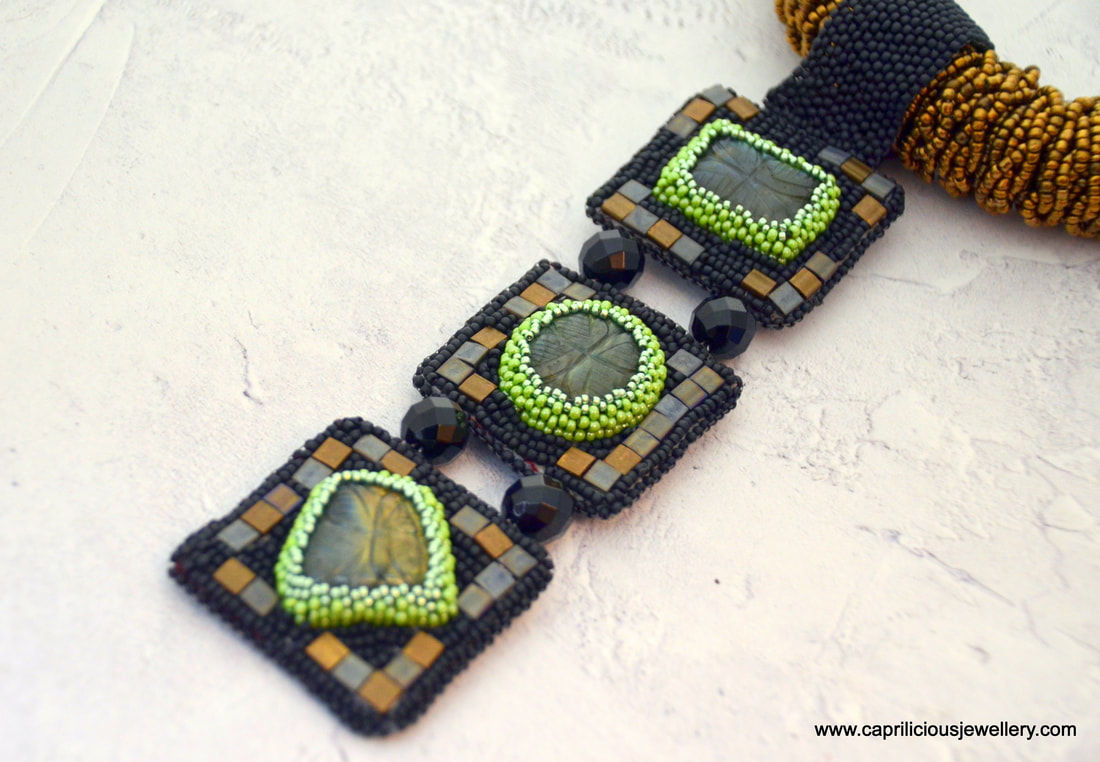 Chequerboard Charisma - Tila beads, Czech Preciosa beads and labradorite by Caprilicious Jewellery. Statement Necklace