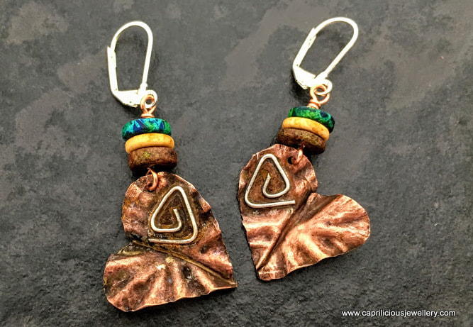 Copper and silver earrings by Caprilicious Jewellery, mixed metal jewellery, foldforming, metalsmithing.