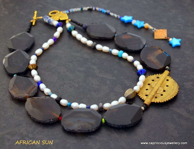 African Sun, black agate slab nugget, African lost wax cast Baule bead, freshwater pearl multi strand necklace by Caprilicious Jewellery