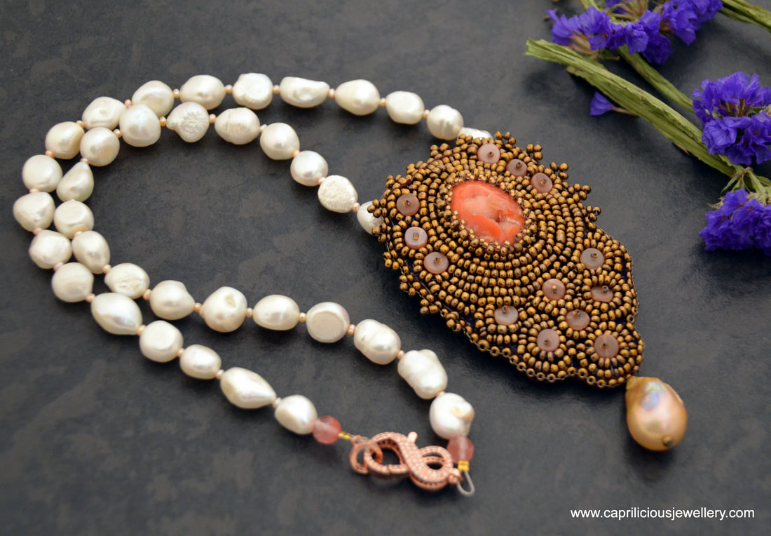 Peach Moonstone and druzy on a necklace of baroque pearls by Caprilicious Jewellery