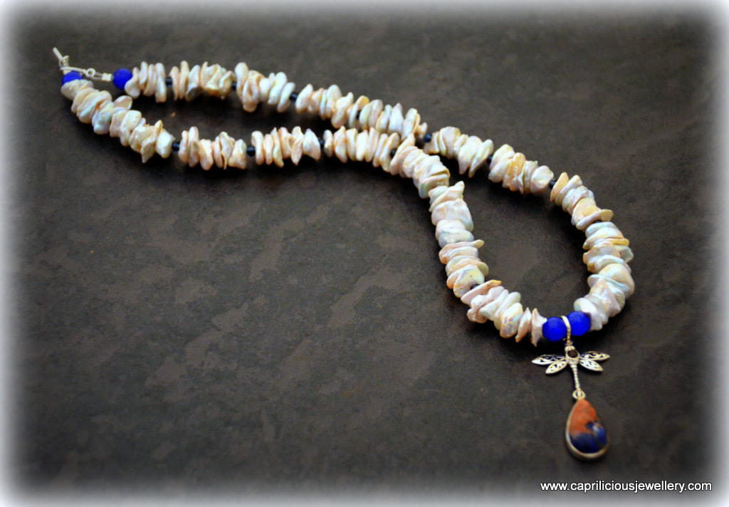 Keshi pearl and orange sodalite/silver dragonfly necklace by Caprilicious Jewellery