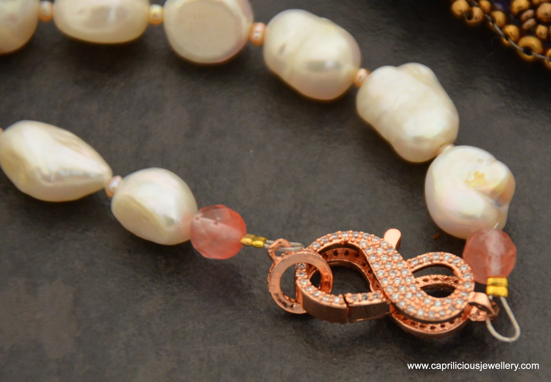 Peach Moonstone and druzy on a necklace of baroque pearls by Caprilicious Jewellery