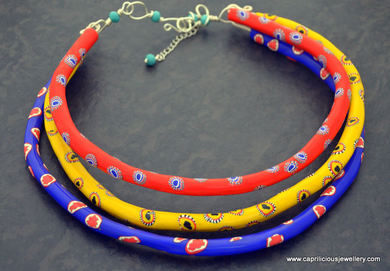 Tribal colourful polymer clay tube necklace inspired by Maasai wedding necklaces by Caprilicious Jewellery