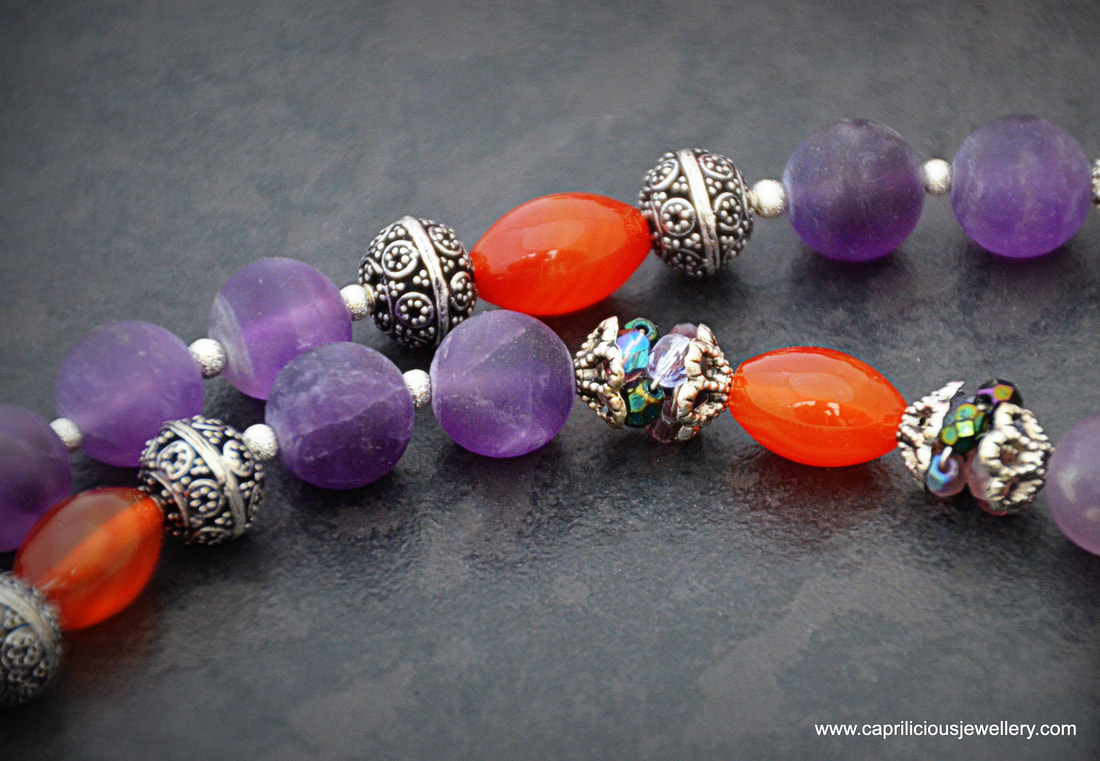 Hamsa, Covid protection jewellery, amethyst, carnelian, fire polished beads, purple and orange, 
