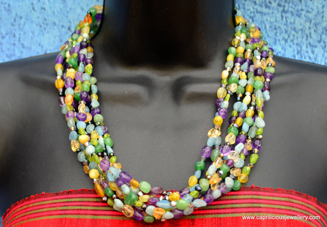 Seven strands of potato nugget beads in a summery necklace by Caprilicious Jewellery