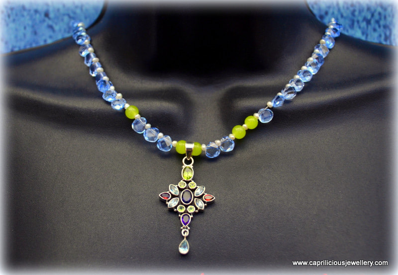 Colourful semi precious and sterling silver pendant on a blue quartz teardrop necklace by Caprilicious Jewellery