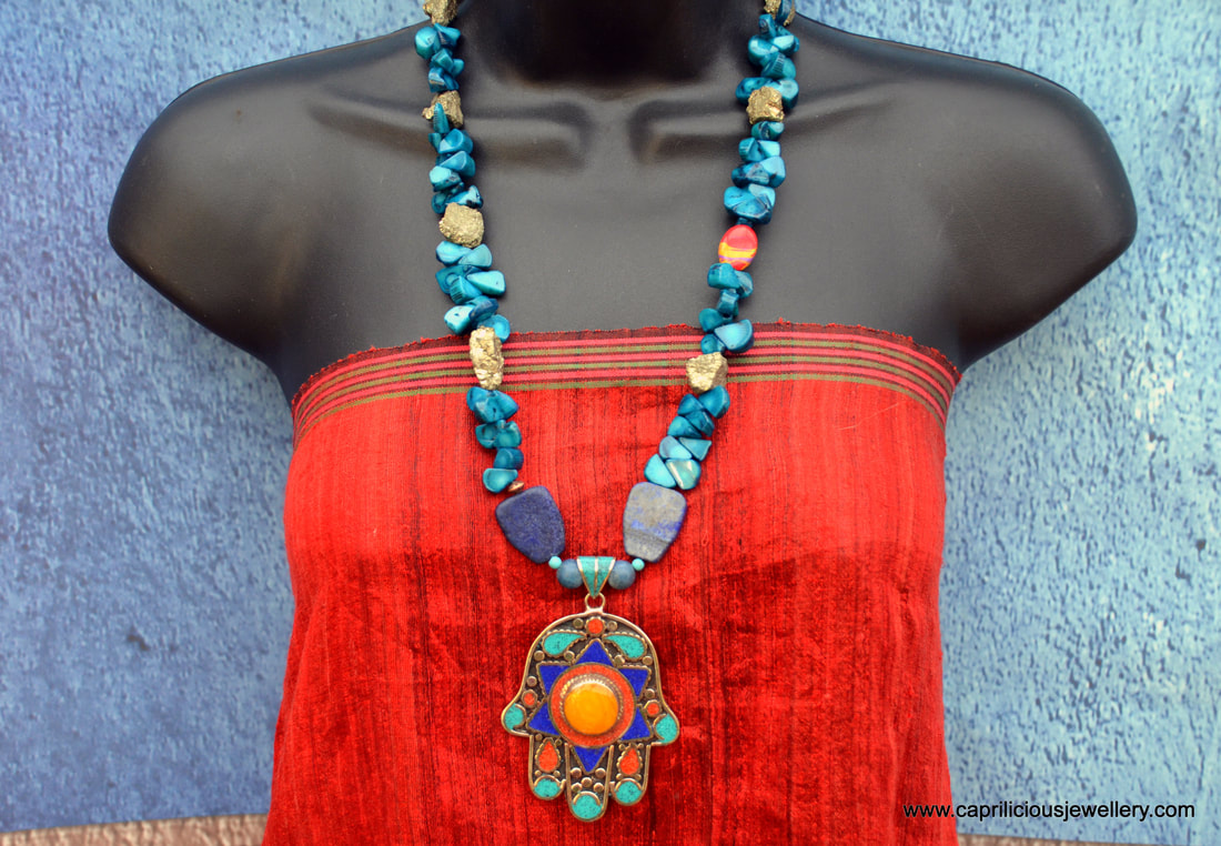 Hamsa and coral necklace by Caprilicious Jewellery
