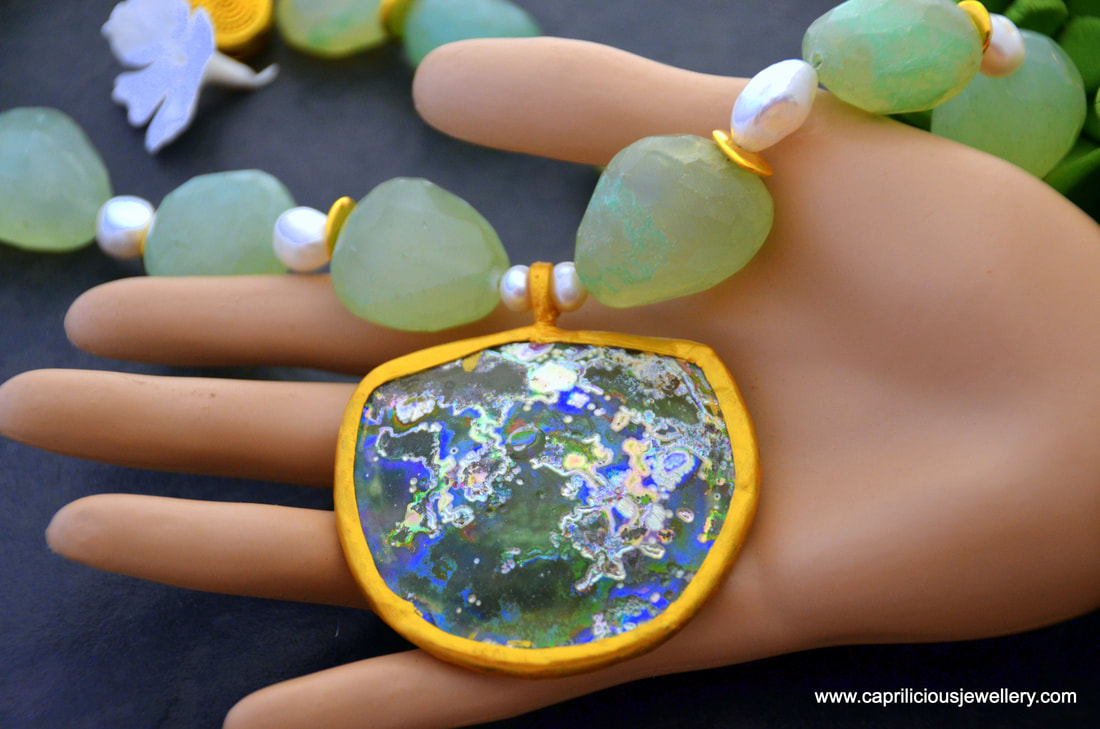 Aurelia, a sea glass pendant with chalcedony sea green nugget beads by Caprilicious Jewellery