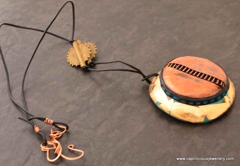 Fold formed copper, leather necklace, lagenlook Jewellery by Caprilicious