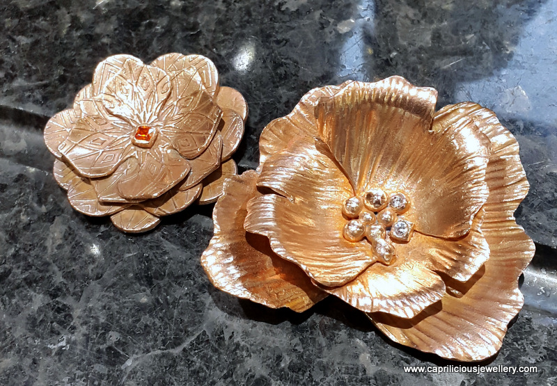 Copper clay flower pendants by Caprilicious Jewellery