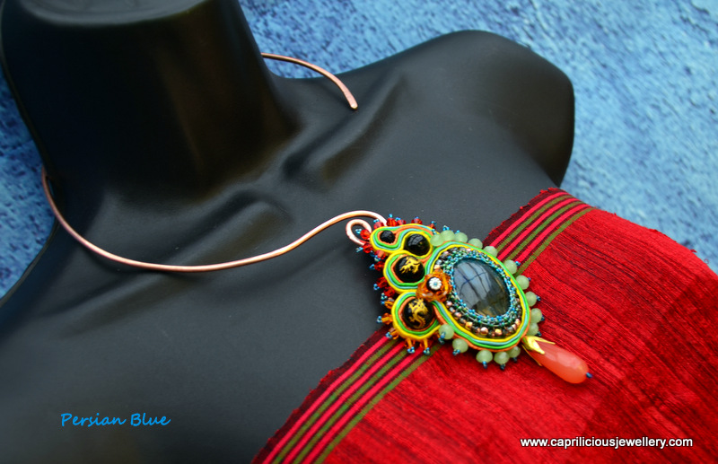 Blue Labradorite pendant with beadwoar and soutache on a copper torque necklace by Caprilicious Jewellery