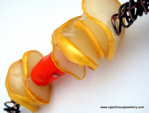 Polymer clay and wire necklace by Caprilicious Jewellery