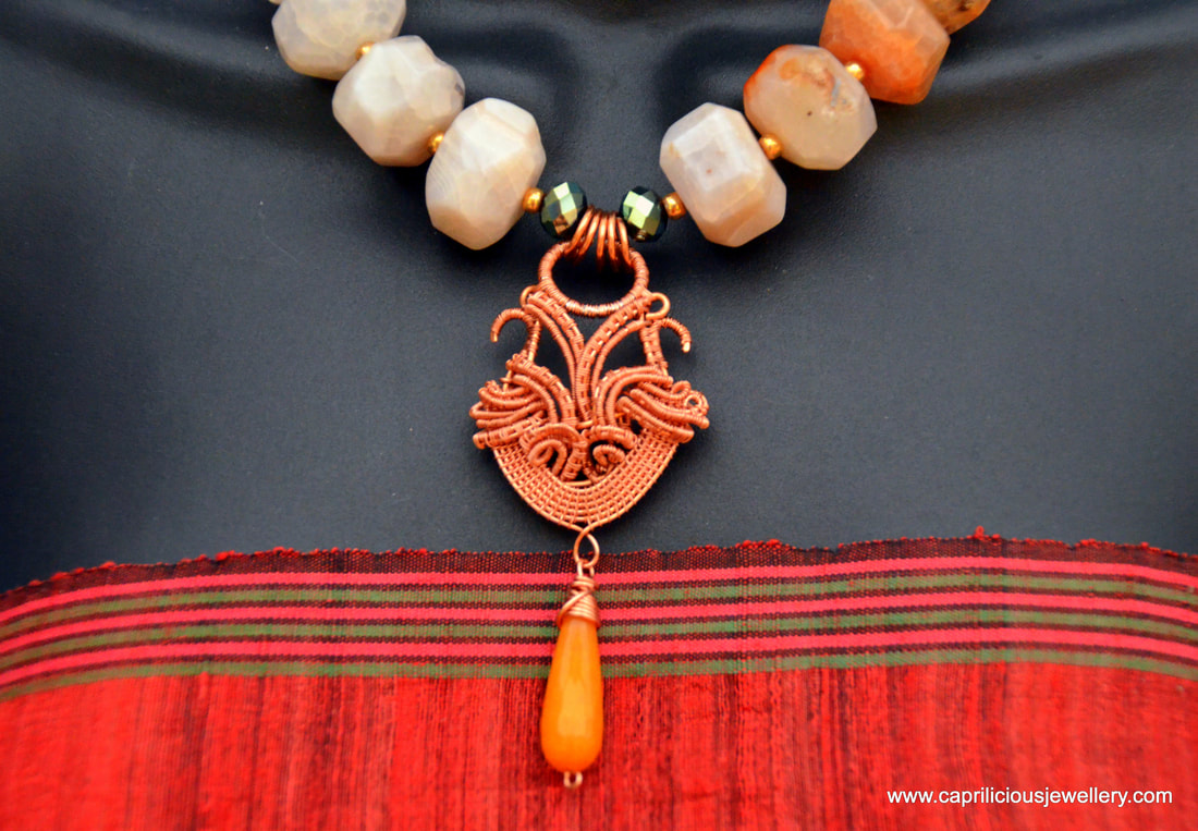 Agate nugget beads and a copper wirework pendant by Caprilicious Jewellery