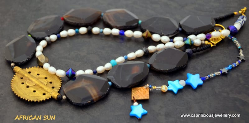 African Sun, black agate slab nugget, African lost wax cast Baule bead, freshwater pearl multi strand necklace by Caprilicious Jewellery