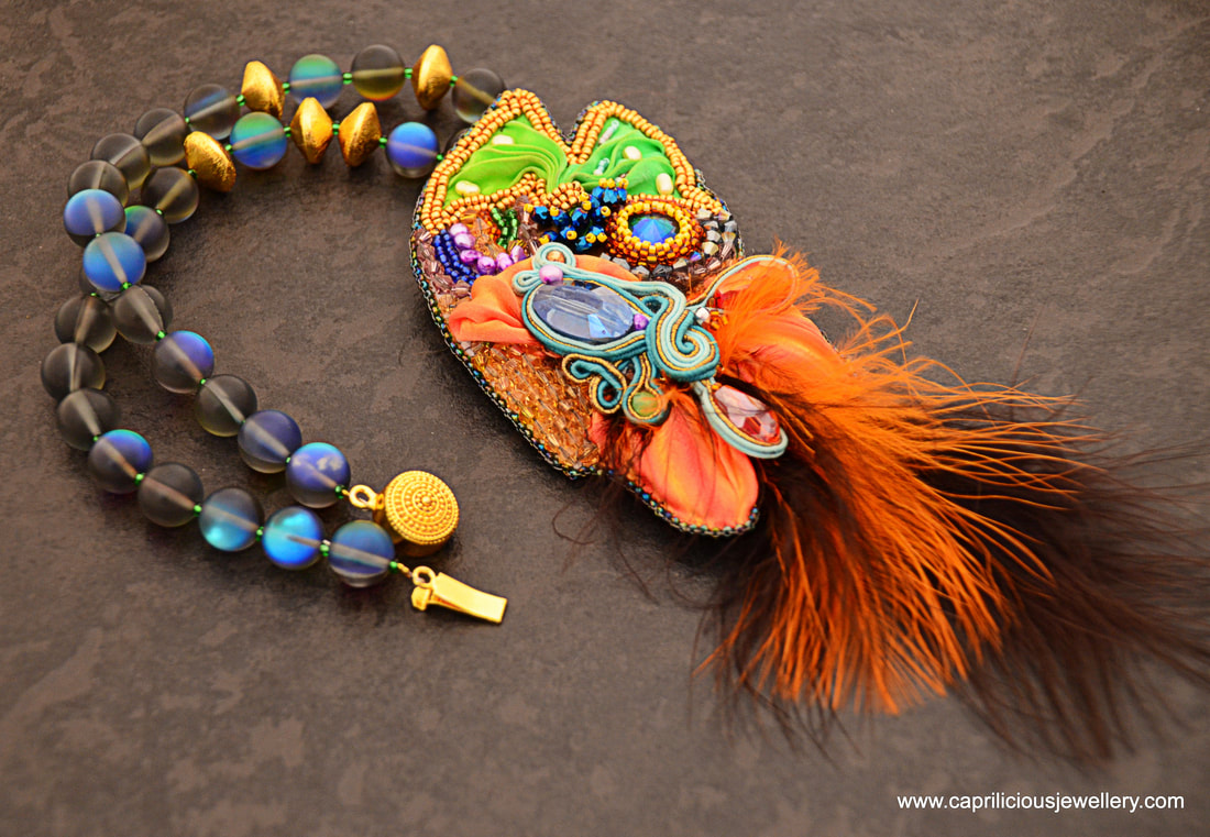 Fantasia - a Shibori and Soutache and feather pendant made by Caprilicious Jewellery