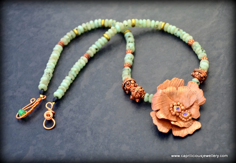 Copper clay flower on a Kiwi jasper necklace, handmade wire clasp by Caprilicious Jewellery