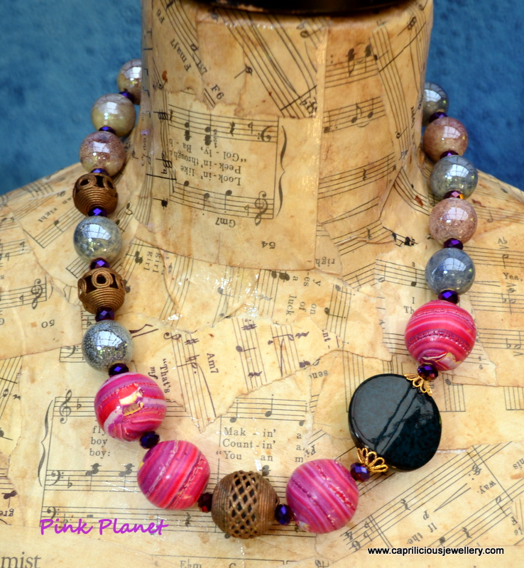 The Pink Planet - a multimedia necklace by Caprilicious Jewellery