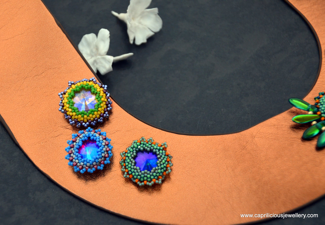 Oriana - a leather necklace with Swarovski Rivolis, and bead embroidery by Caprilicious Jewellery