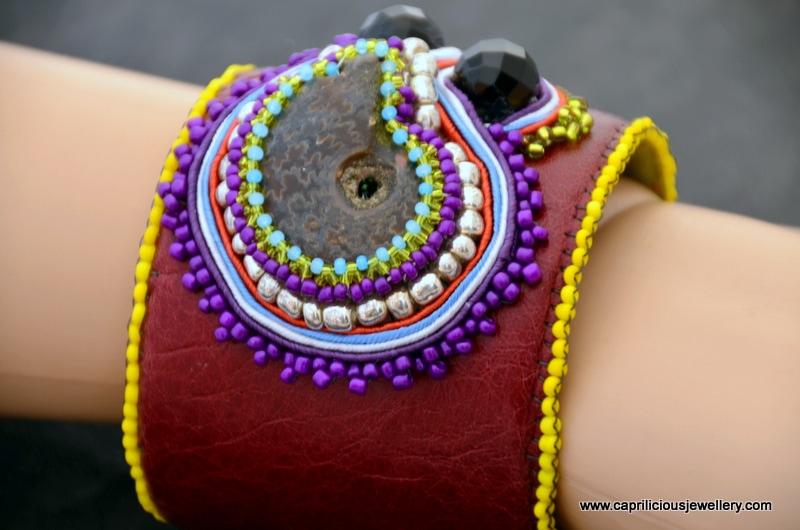 Leather cuff with ammonite fossil, beadwork and soutache by Caprilicious Jewellery