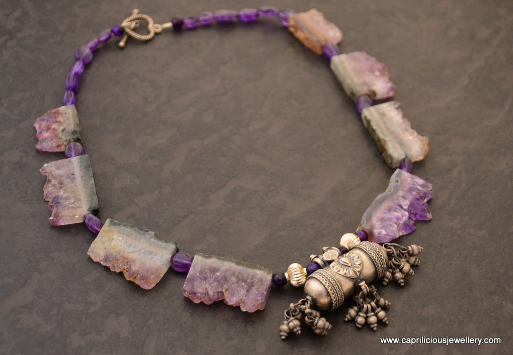 Amethyst geode bead and sterling silver amulet in a statement necklace by Caprilicious Jewellery