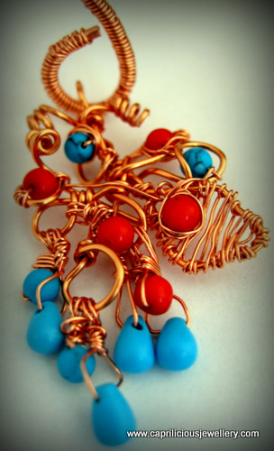 Copper wire armband embellished with coral and turquoise beads by Caprilicious Jewellery