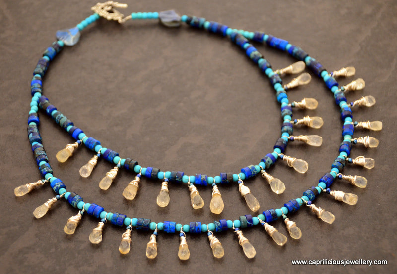 Citrine teardrops, sea sediment jasper and turquoise in an Egyptian style necklace by Caprilicious 