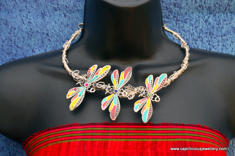 Dragonflies with cold enamel colouring on a wire torque necklace by Caprilicious Jewellery