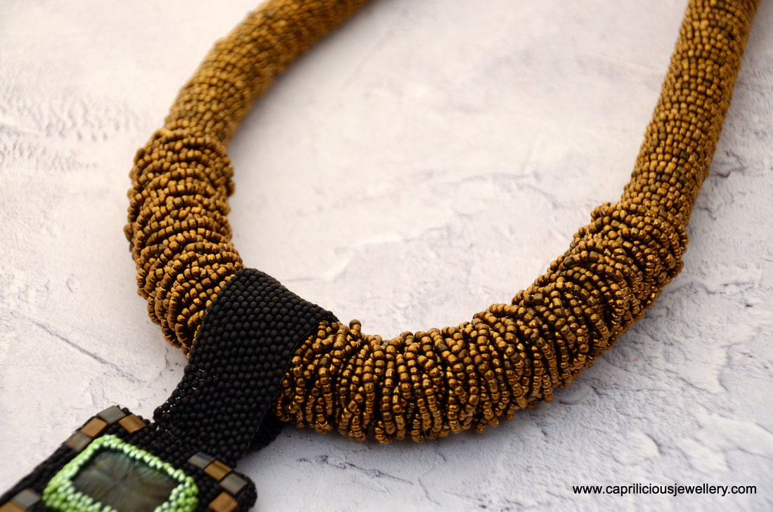 Chequerboard Charisma - Tila beads, Czech Preciosa beads and labradorite by Caprilicious Jewellery. Statement Necklace