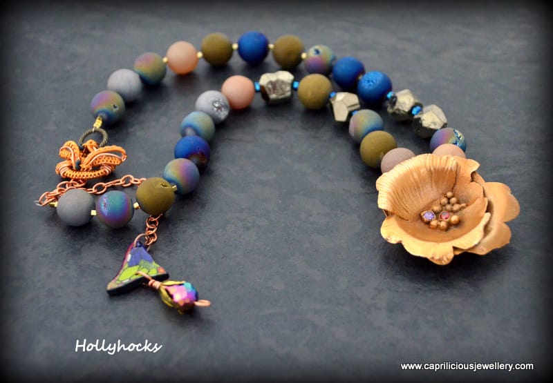 Hollyhocks - bronze clay flower, druzy agate beads, handmade wire clasp, polymer clay and resin butterfly wing made by Caprilicious Jewellery