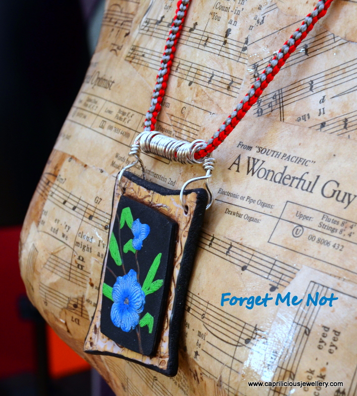 Forget Me Not - polymer clay pendant on a Kumihimo Braid by Caprilicious Jewellery