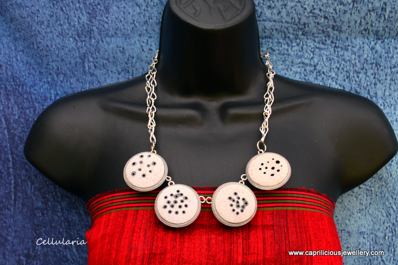 Cellularia - a polymer clay necklace designed by Christine Dumont, made by Caprilicious Jewellery