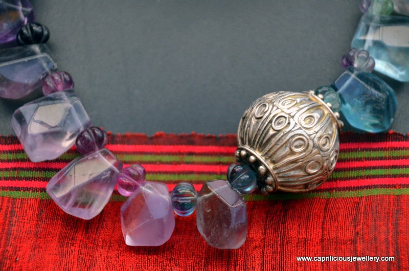 Fluorite teardrop beads and Moroccan focal bead in a colourful necklace by Caprilicious Jewellery