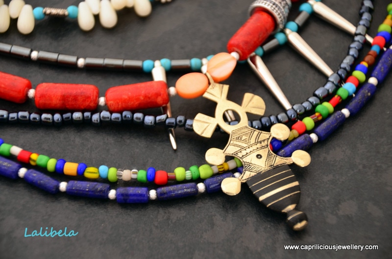 Ethiopian Coptic Cross, multistrand necklace, coral, Trade beads, seed beads, lapis lazuli, haematite by Caprilicious Jewellery