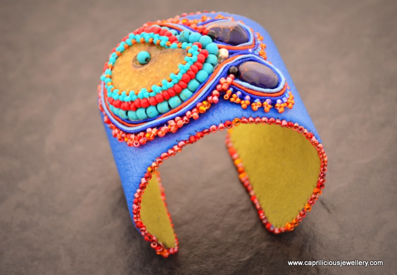 Soutache and leather cuff with an ammonite fossil by Caprilicious Jewellery